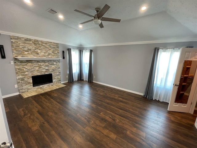 7802 Strathclyde Sound Rd, Houston, TX 77095 - unfurnished living room featuring ceiling fan, plenty of natural light, lofted ceiling, wood finished floors, and a fireplace