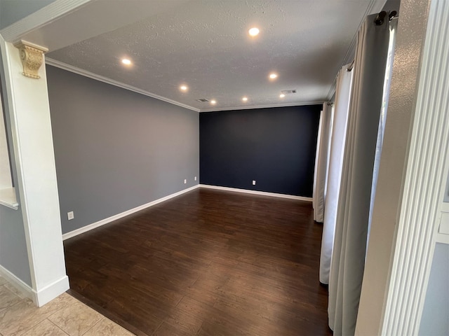 7802 Strathclyde Sound Rd, Houston, TX 77095 - unfurnished room with ornamental molding, recessed lighting, wood finished floors, baseboards, and a textured ceiling