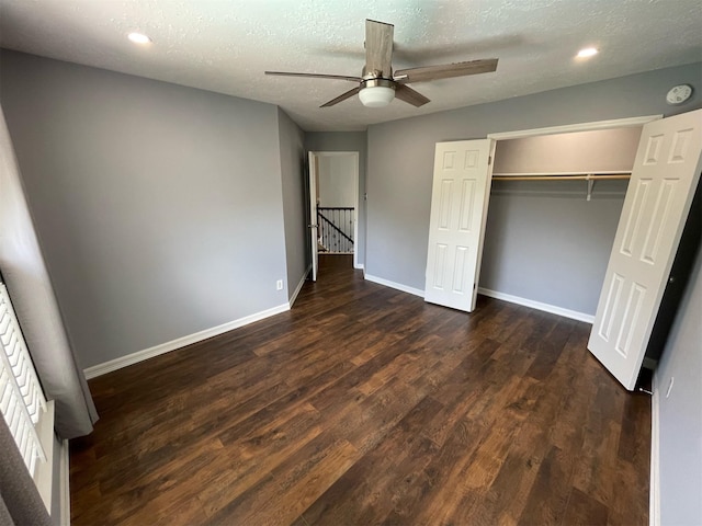 7802 Strathclyde Sound Rd, Houston, TX 77095 - unfurnished bedroom with dark wood-style floors, baseboards, a closet, recessed lighting, and a ceiling fan