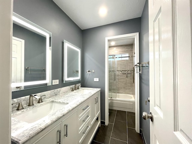 7802 Strathclyde Sound Rd, Houston, TX 77095 - bathroom with double vanity, enclosed tub / shower combo, and tile patterned flooring