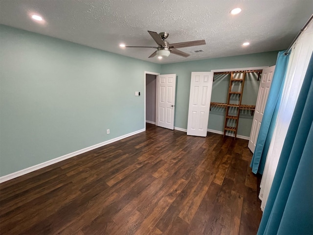 7802 Strathclyde Sound Rd, Houston, TX 77095 - unfurnished bedroom with dark wood-style floors, recessed lighting, baseboards, a textured ceiling, and ceiling fan