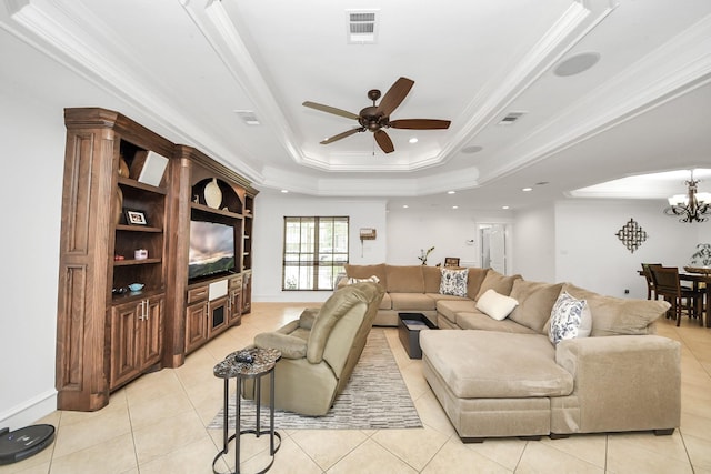 24 Woody Creek Dr, Conroe, TX 77301 - living area featuring a tray ceiling, ceiling fan, a chandelier, light tile patterned flooring, and ornamental molding