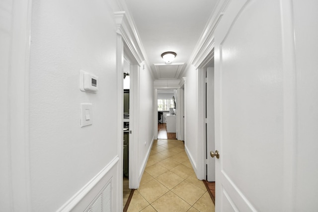 24 Woody Creek Dr, Conroe, TX 77301 - hall with attic access, light tile patterned floors, and baseboards