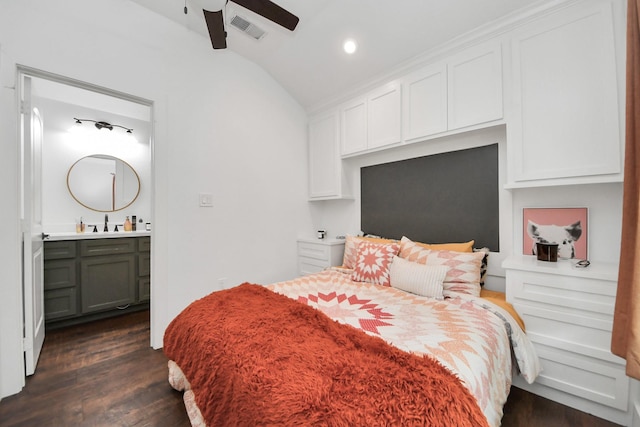 24 Woody Creek Dr, Conroe, TX 77301 - bedroom featuring vaulted ceiling, dark wood-type flooring, ensuite bathroom, recessed lighting, and a sink