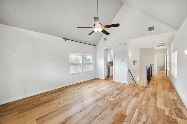 4209 Billingsley St, Houston, TX 77009 - spare room with attic access, light wood-style floors, high vaulted ceiling, ceiling fan, and baseboards