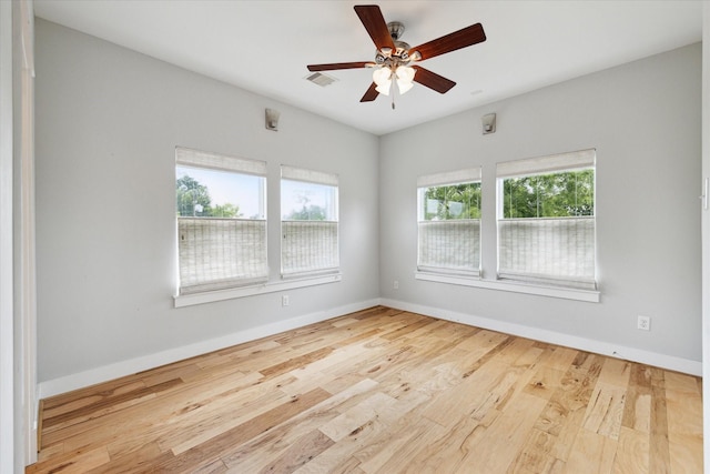 4209 Billingsley St, Houston, TX 77009 - empty room with wood finished floors, baseboards, and ceiling fan