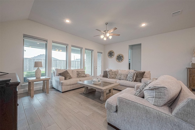 29042 Hauter Way, Fulshear, TX 77441 - living room with plenty of natural light, a ceiling fan, vaulted ceiling, light wood-style floors, and recessed lighting
