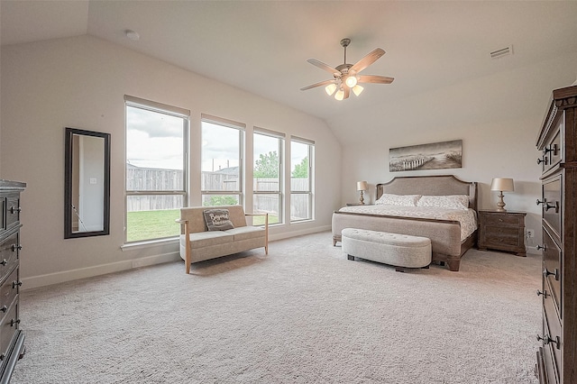29042 Hauter Way, Fulshear, TX 77441 - carpeted bedroom featuring lofted ceiling, multiple windows, baseboards, and a ceiling fan