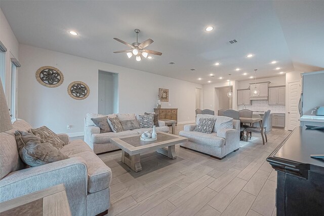 29042 Hauter Way, Fulshear, TX 77441 - living room with ceiling fan, light wood finished floors, and recessed lighting