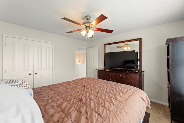 44 Parkway Pl, Houston, TX 77040 - bedroom with carpet flooring, a closet, baseboards, and ceiling fan