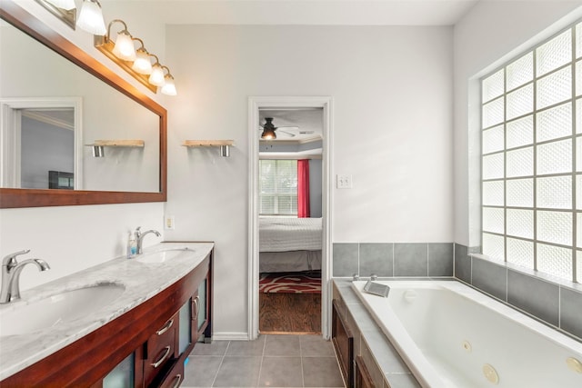 44 Parkway Pl, Houston, TX 77040 - bathroom with double vanity, tile patterned flooring, a whirlpool tub, ensuite bathroom, and ceiling fan
