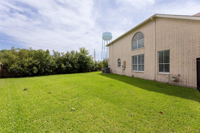 44 Parkway Pl, Houston, TX 77040 - view of green lawn featuring central air condition unit