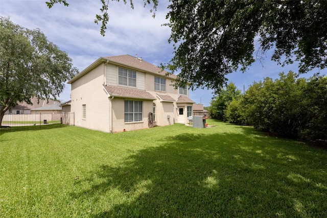 44 Parkway Pl, Houston, TX 77040 - back of property with brick siding and a shingled roof