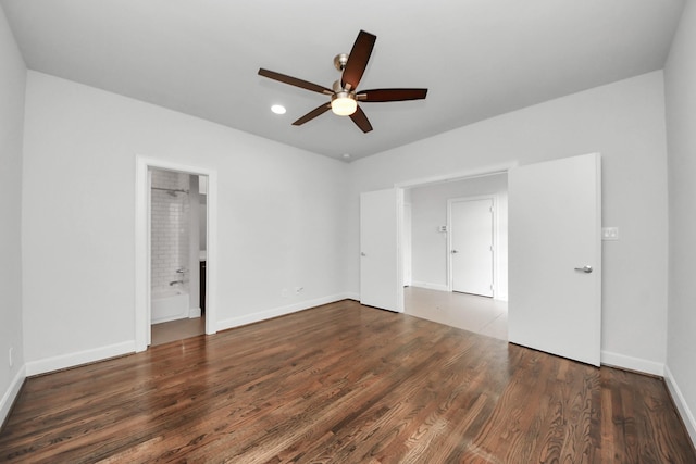 310 Eado Park Cir, Houston, TX 77020 - unfurnished bedroom with wood finished floors, baseboards, a ceiling fan, recessed lighting, and ensuite bath