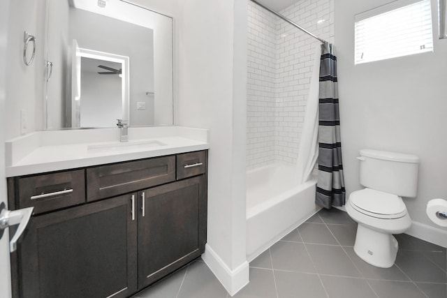 310 Eado Park Cir, Houston, TX 77020 - bathroom featuring vanity, baseboards, toilet, shower / bathtub combination with curtain, and tile patterned flooring