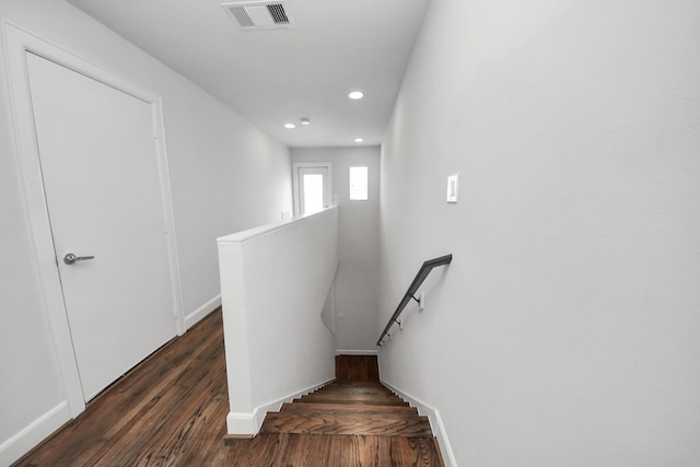 310 Eado Park Cir, Houston, TX 77020 - stairs featuring recessed lighting, wood finished floors, and baseboards