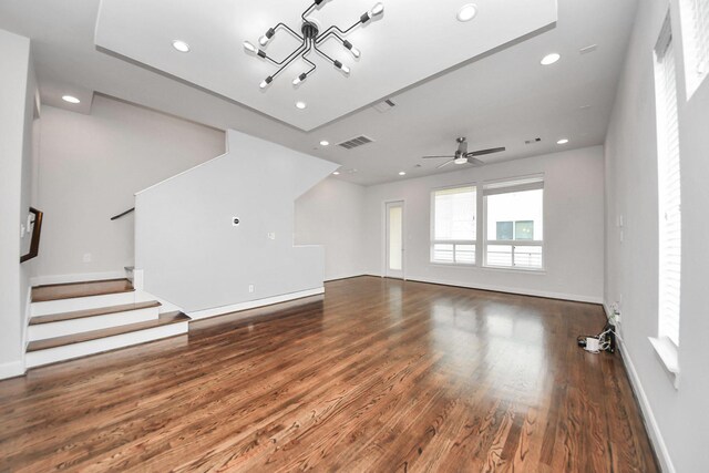310 Eado Park Cir, Houston, TX 77020 - unfurnished living room with wood finished floors, recessed lighting, stairs, baseboards, and ceiling fan