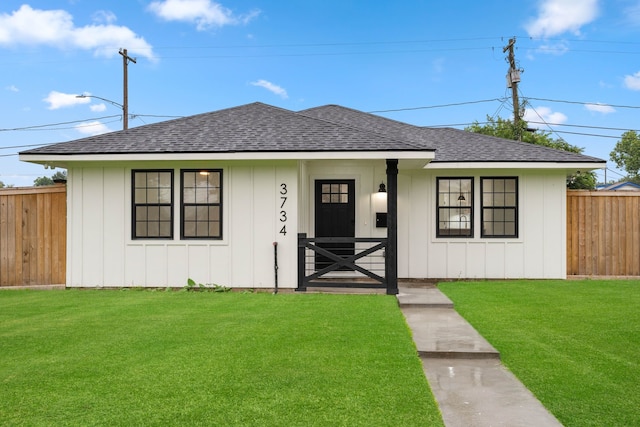 3734 Florinda St, Houston, TX 77021 - bungalow with a shingled roof and board and batten siding