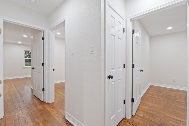 3734 Florinda St, Houston, TX 77021 - hall featuring light wood finished floors and recessed lighting