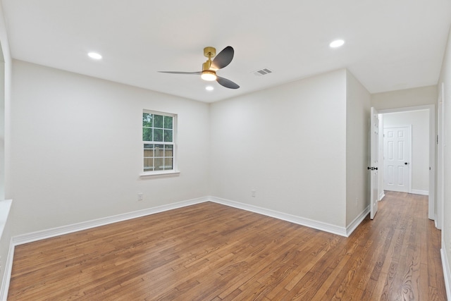 3734 Florinda St, Houston, TX 77021 - empty room with a ceiling fan, wood finished floors, and recessed lighting