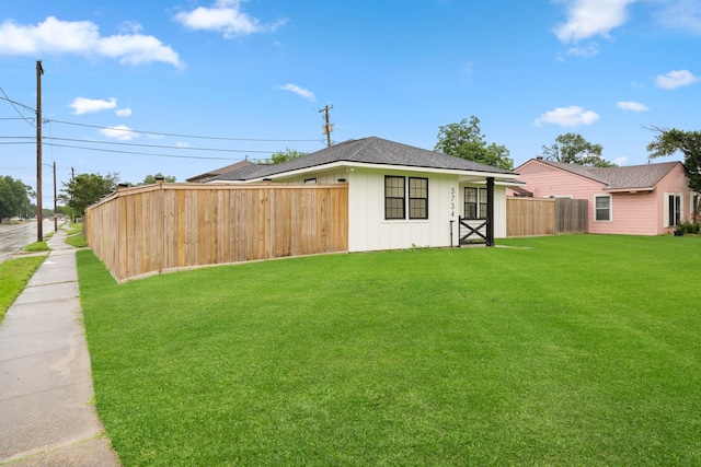 3734 Florinda St, Houston, TX 77021 - view of property exterior with board and batten siding and a shingled roof