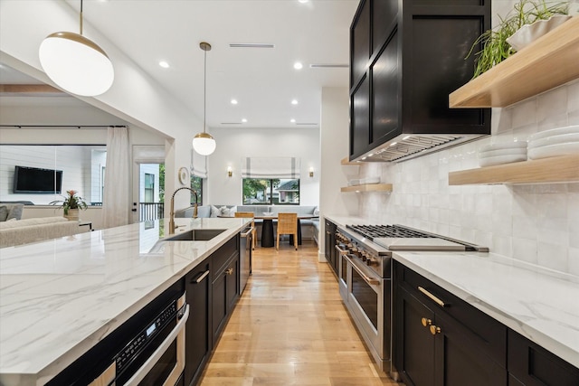 1917 Ebony Ln, Houston, TX 77018 - kitchen featuring high end stainless steel range, open shelves, dark cabinets, extractor fan, and light wood finished floors