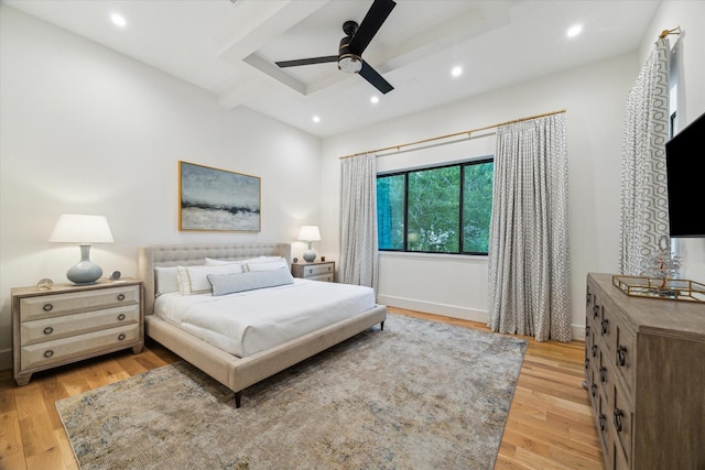 1917 Ebony Ln, Houston, TX 77018 - bedroom with light wood finished floors, recessed lighting, a tray ceiling, and a ceiling fan