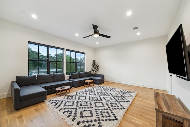 1917 Ebony Ln, Houston, TX 77018 - living area with a ceiling fan, light wood-type flooring, and recessed lighting