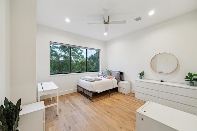 1917 Ebony Ln, Houston, TX 77018 - bedroom with light wood-style flooring, recessed lighting, and ceiling fan