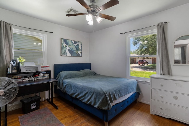 313 Ellen Dr, Deer Park, TX 77536 - bedroom featuring light wood-style floors and ceiling fan