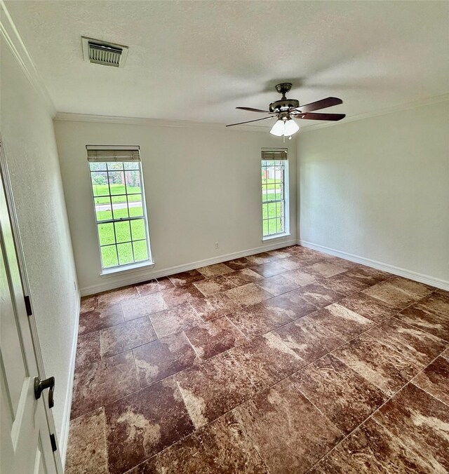 200 Wentworth Dr, West Columbia, TX 77486 - unfurnished room with plenty of natural light, ornamental molding, baseboards, a ceiling fan, and a textured ceiling