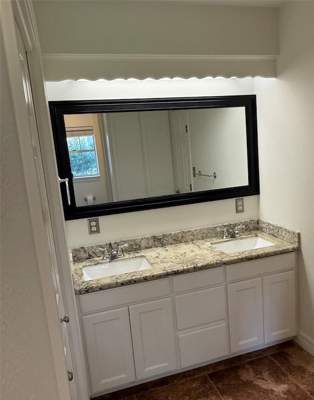 200 Wentworth Dr, West Columbia, TX 77486 - bathroom with double vanity and baseboards