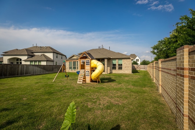 15003 Big Spring Park Dr, Cypress, TX 77433 - rear view of property with a playground, a fenced backyard, and brick siding