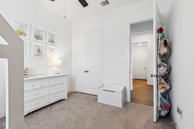 15003 Big Spring Park Dr, Cypress, TX 77433 - bedroom with light carpet, a closet, and ceiling fan