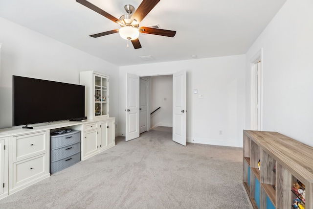 15003 Big Spring Park Dr, Cypress, TX 77433 - unfurnished living room featuring light carpet and a ceiling fan