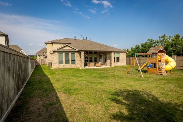 15003 Big Spring Park Dr, Cypress, TX 77433 - rear view of house featuring outdoor lounge area, a fenced backyard, and a playground