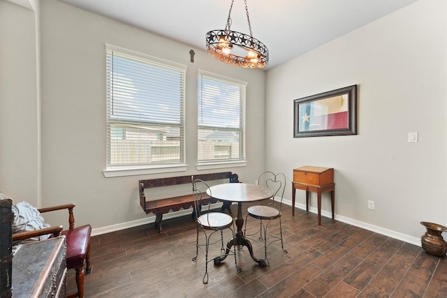 17040 Shy Leaf Ct, Conroe, TX 77385 - dining space featuring baseboards and dark wood-style flooring