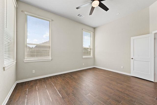 17040 Shy Leaf Ct, Conroe, TX 77385 - empty room with a ceiling fan, baseboards, and wood finished floors