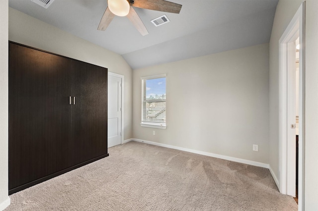 17040 Shy Leaf Ct, Conroe, TX 77385 - unfurnished bedroom featuring vaulted ceiling, light colored carpet, baseboards, and a ceiling fan
