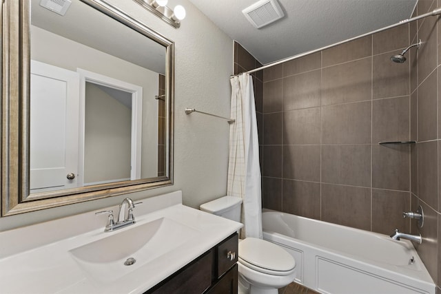 17040 Shy Leaf Ct, Conroe, TX 77385 - full bath with vanity, toilet, shower / tub combo, and a textured ceiling