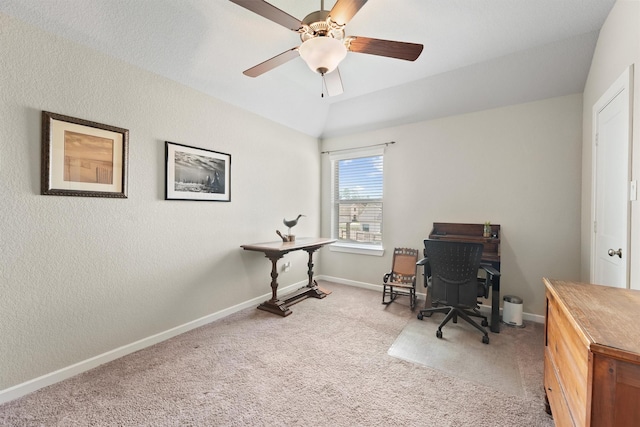 17040 Shy Leaf Ct, Conroe, TX 77385 - office area with light carpet, ceiling fan, baseboards, lofted ceiling, and a textured wall
