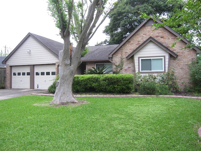 5934 Hummingbird St, Houston, TX 77096 - single story home featuring a garage, a front lawn, driveway, and brick siding