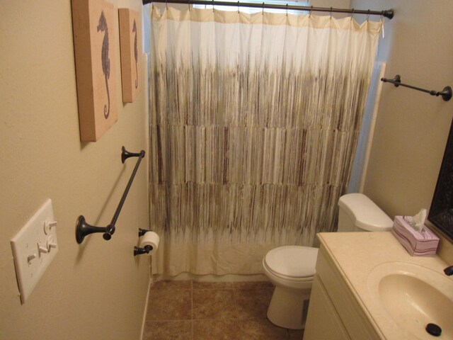 5934 Hummingbird St, Houston, TX 77096 - bathroom with toilet, vanity, tile patterned flooring, and shower / bath combination with curtain