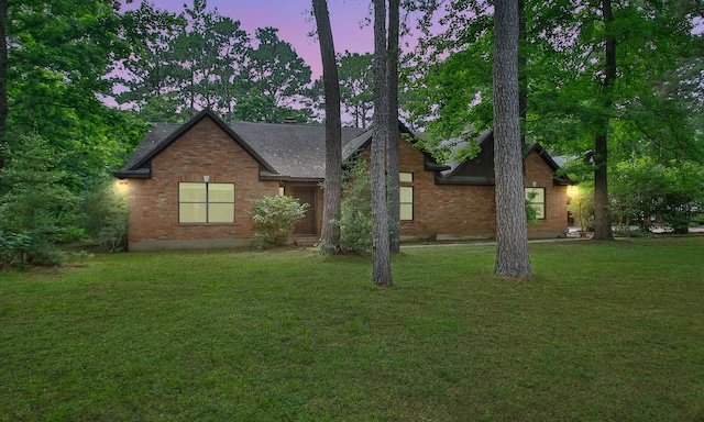 22402 Timber Ridge Dr, Magnolia, TX 77355 - view of front facade featuring a front lawn, brick siding, and roof with shingles