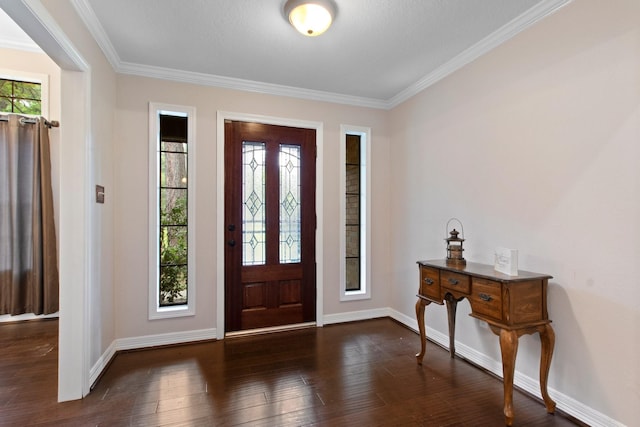 22402 Timber Ridge Dr, Magnolia, TX 77355 - entrance foyer featuring crown molding, dark wood-style flooring, and baseboards