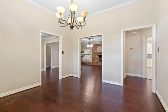 22402 Timber Ridge Dr, Magnolia, TX 77355 - unfurnished dining area with a chandelier, dark wood-style flooring, baseboards, a ceiling fan, and ornamental molding