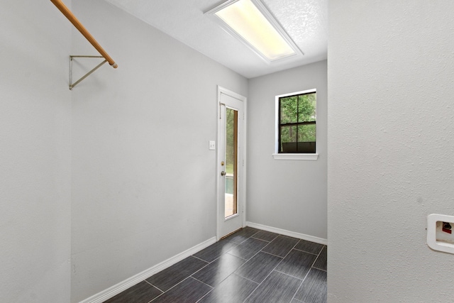 22402 Timber Ridge Dr, Magnolia, TX 77355 - entryway featuring baseboards
