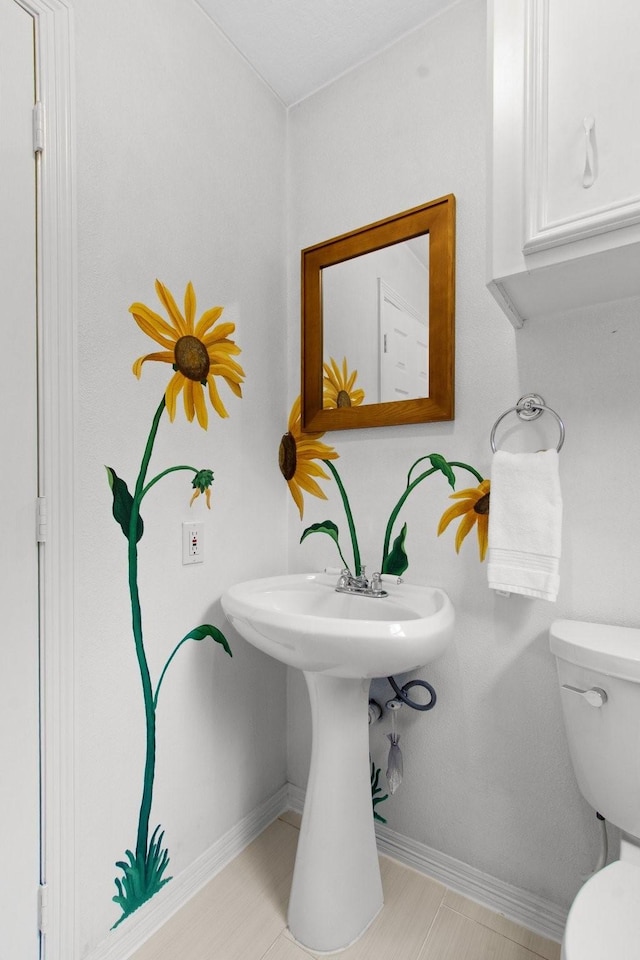 22402 Timber Ridge Dr, Magnolia, TX 77355 - bathroom with baseboards and toilet