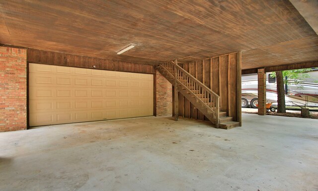 22402 Timber Ridge Dr, Magnolia, TX 77355 - garage featuring wooden ceiling