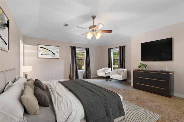 22402 Timber Ridge Dr, Magnolia, TX 77355 - bedroom with light carpet, baseboards, and ceiling fan